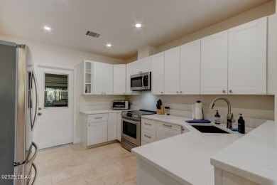 Come & tour this amazing 3 Bedroom 2 Bath, plus office, end unit on Spruce Creek Golf Club in Florida - for sale on GolfHomes.com, golf home, golf lot