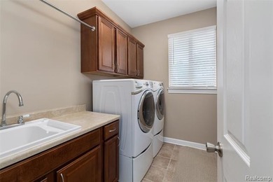 EXCLUSIVE BUYER INCENTIVE: SELLER TO PAY ONE (1) YEAR OF on Prestwick Village Golf Club in Michigan - for sale on GolfHomes.com, golf home, golf lot