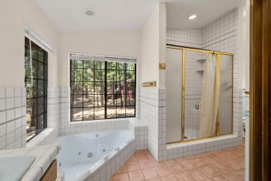 Inviting Four-Bedroom Clerestory Cabin in Blue Lake Springs on Sequoia Woods Country Club in California - for sale on GolfHomes.com, golf home, golf lot