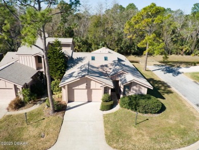 Come & tour this amazing 3 Bedroom 2 Bath, plus office, end unit on Spruce Creek Golf Club in Florida - for sale on GolfHomes.com, golf home, golf lot