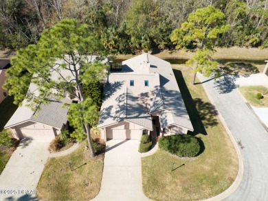 Come & tour this amazing 3 Bedroom 2 Bath, plus office, end unit on Spruce Creek Golf Club in Florida - for sale on GolfHomes.com, golf home, golf lot