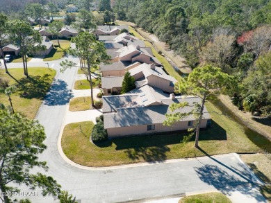 Come & tour this amazing 3 Bedroom 2 Bath, plus office, end unit on Spruce Creek Golf Club in Florida - for sale on GolfHomes.com, golf home, golf lot