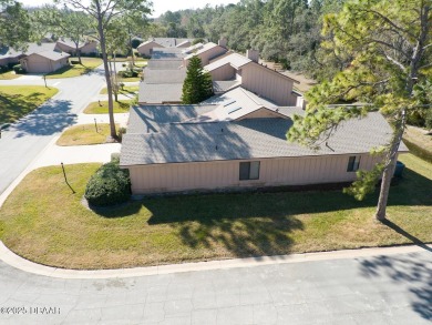 Come & tour this amazing 3 Bedroom 2 Bath, plus office, end unit on Spruce Creek Golf Club in Florida - for sale on GolfHomes.com, golf home, golf lot