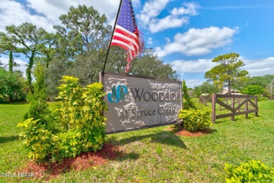 Come & tour this amazing 3 Bedroom 2 Bath, plus office, end unit on Spruce Creek Golf Club in Florida - for sale on GolfHomes.com, golf home, golf lot