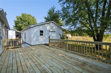 Spacious, clean and move-in ready! Freshly painted, new kitchen on Linn Valley Lakes - Deer Trace Golf Course in Kansas - for sale on GolfHomes.com, golf home, golf lot