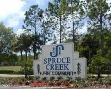 Come & tour this amazing 3 Bedroom 2 Bath, plus office, end unit on Spruce Creek Golf Club in Florida - for sale on GolfHomes.com, golf home, golf lot