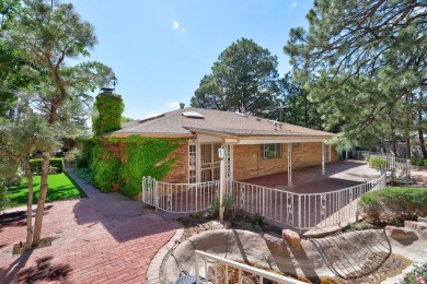 This HOME draws you in with a long driveway and gorgeous, fully on The Canyon Club in New Mexico - for sale on GolfHomes.com, golf home, golf lot