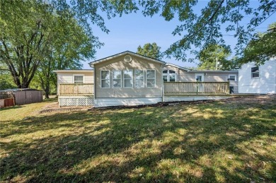 Spacious, clean and move-in ready! Freshly painted, new kitchen on Linn Valley Lakes - Deer Trace Golf Course in Kansas - for sale on GolfHomes.com, golf home, golf lot