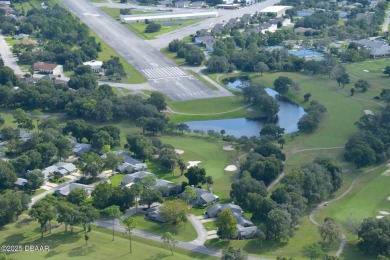 Come & tour this amazing 3 Bedroom 2 Bath, plus office, end unit on Spruce Creek Golf Club in Florida - for sale on GolfHomes.com, golf home, golf lot