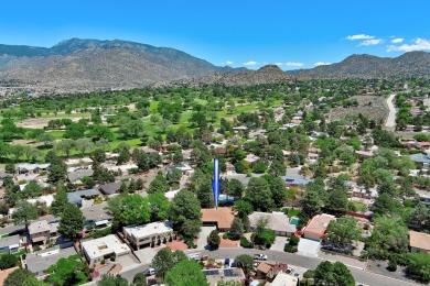 This HOME draws you in with a long driveway and gorgeous, fully on The Canyon Club in New Mexico - for sale on GolfHomes.com, golf home, golf lot