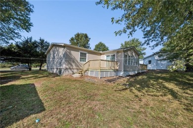 Spacious, clean and move-in ready! Freshly painted, new kitchen on Linn Valley Lakes - Deer Trace Golf Course in Kansas - for sale on GolfHomes.com, golf home, golf lot