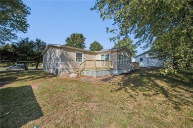 Spacious, clean and move-in ready! Freshly painted, new kitchen on Linn Valley Lakes - Deer Trace Golf Course in Kansas - for sale on GolfHomes.com, golf home, golf lot