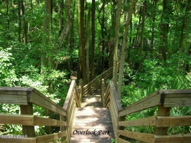Come & tour this amazing 3 Bedroom 2 Bath, plus office, end unit on Spruce Creek Golf Club in Florida - for sale on GolfHomes.com, golf home, golf lot