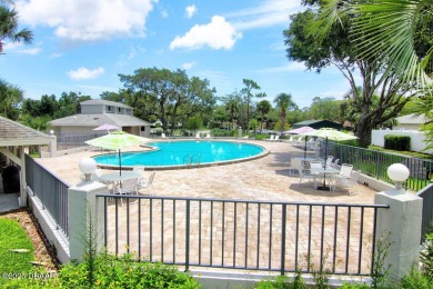 Come & tour this amazing 3 Bedroom 2 Bath, plus office, end unit on Spruce Creek Golf Club in Florida - for sale on GolfHomes.com, golf home, golf lot