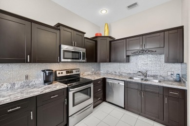 Experience resort living in this beautifully updated 2 bed, 2 on Polo Club of Boca Raton in Florida - for sale on GolfHomes.com, golf home, golf lot