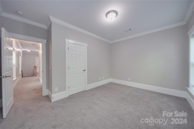 Come tour this beautifully updated home - your perfect escape on Cedarwood Country Club in North Carolina - for sale on GolfHomes.com, golf home, golf lot