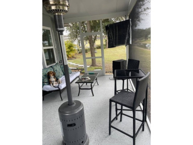 Location with stunning views of the golf course and waterpletely on Del Tura Golf and Country Club in Florida - for sale on GolfHomes.com, golf home, golf lot