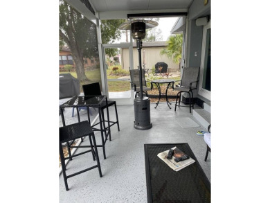 Location with stunning views of the golf course and waterpletely on Del Tura Golf and Country Club in Florida - for sale on GolfHomes.com, golf home, golf lot