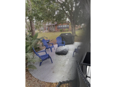 Location with stunning views of the golf course and waterpletely on Del Tura Golf and Country Club in Florida - for sale on GolfHomes.com, golf home, golf lot