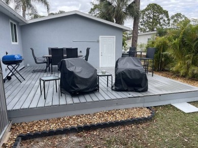 Location with stunning views of the golf course and waterpletely on Del Tura Golf and Country Club in Florida - for sale on GolfHomes.com, golf home, golf lot