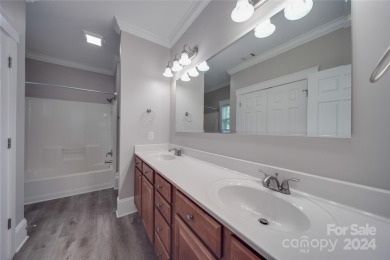 Come tour this beautifully updated home - your perfect escape on Cedarwood Country Club in North Carolina - for sale on GolfHomes.com, golf home, golf lot