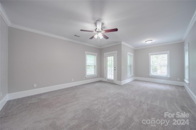 Come tour this beautifully updated home - your perfect escape on Cedarwood Country Club in North Carolina - for sale on GolfHomes.com, golf home, golf lot