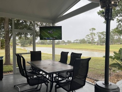 Location with stunning views of the golf course and waterpletely on Del Tura Golf and Country Club in Florida - for sale on GolfHomes.com, golf home, golf lot