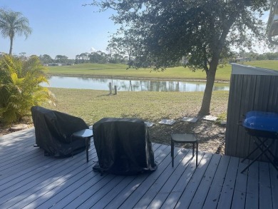Location with stunning views of the golf course and waterpletely on Del Tura Golf and Country Club in Florida - for sale on GolfHomes.com, golf home, golf lot