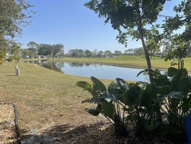 Location with stunning views of the golf course and waterpletely on Del Tura Golf and Country Club in Florida - for sale on GolfHomes.com, golf home, golf lot