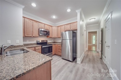 Come tour this beautifully updated home - your perfect escape on Cedarwood Country Club in North Carolina - for sale on GolfHomes.com, golf home, golf lot