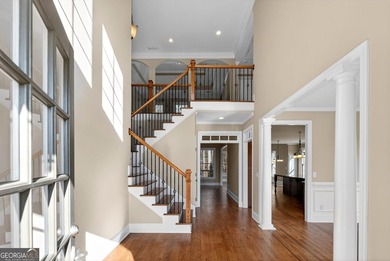 Located in BridgeMill, this well-maintained home offers the on Bridgemill Golf Club in Georgia - for sale on GolfHomes.com, golf home, golf lot