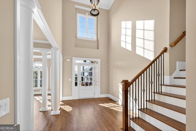 Located in BridgeMill, this well-maintained home offers the on Bridgemill Golf Club in Georgia - for sale on GolfHomes.com, golf home, golf lot