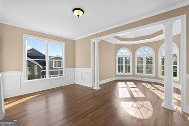 Located in BridgeMill, this well-maintained home offers the on Bridgemill Golf Club in Georgia - for sale on GolfHomes.com, golf home, golf lot