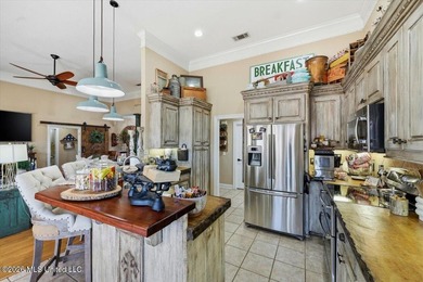 Welcome home to 522 Patrick Farms Drive! If you are looking for on Patrick Farms Golf Club in Mississippi - for sale on GolfHomes.com, golf home, golf lot