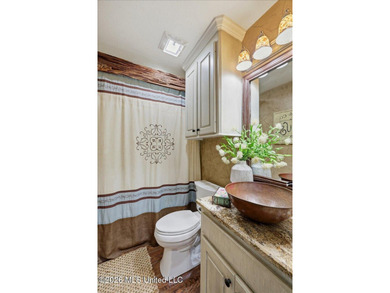 Welcome home to 522 Patrick Farms Drive! If you are looking for on Patrick Farms Golf Club in Mississippi - for sale on GolfHomes.com, golf home, golf lot