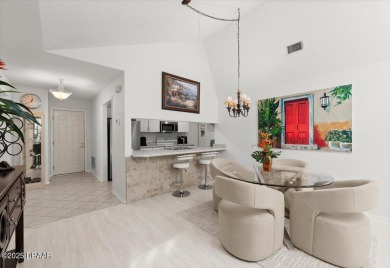 Experience vibrant waterfront living in this exceptionally on The Club At Pelican Bay - North Course in Florida - for sale on GolfHomes.com, golf home, golf lot