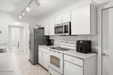 Experience vibrant waterfront living in this exceptionally on The Club At Pelican Bay - North Course in Florida - for sale on GolfHomes.com, golf home, golf lot