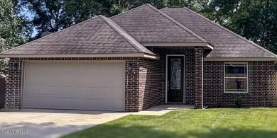 Don't miss out on this perfect home next to the serene Twin on Diamondhead Country Club in Mississippi - for sale on GolfHomes.com, golf home, golf lot