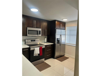 One-of-a-Kind Gem in Inverrary's Desirable Las Vistas Community! on Inverrary Country Club in Florida - for sale on GolfHomes.com, golf home, golf lot