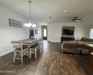 Don't miss out on this perfect home next to the serene Twin on Diamondhead Country Club in Mississippi - for sale on GolfHomes.com, golf home, golf lot