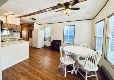 Welcome to your peaceful getaway! Located in The Holiday Out RV on Lake Tansi Village Country Club in Tennessee - for sale on GolfHomes.com, golf home, golf lot