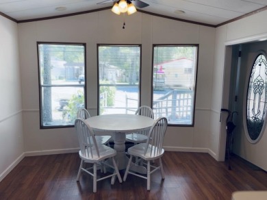 Welcome to your peaceful getaway! Located in The Holiday Out RV on Lake Tansi Village Country Club in Tennessee - for sale on GolfHomes.com, golf home, golf lot