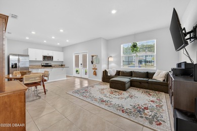 Live the Venetian Bay lifestyle in this stylish 2022-built on Venetian Bay Golf Course in Florida - for sale on GolfHomes.com, golf home, golf lot