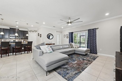 Welcome to this beautifully maintained 4-bedroom, 3-bath home in on The Palencia Club in Florida - for sale on GolfHomes.com, golf home, golf lot