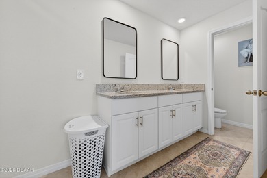 Live the Venetian Bay lifestyle in this stylish 2022-built on Venetian Bay Golf Course in Florida - for sale on GolfHomes.com, golf home, golf lot