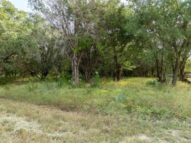Serenity awaits!  At just over .25 acre, this beautifully wooded on White Bluff Resort - Old Course in Texas - for sale on GolfHomes.com, golf home, golf lot