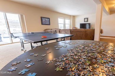 This Granby Ranch home offers a fantastic combination of comfort on Headwaters Golf Course At Granby Ranch in Colorado - for sale on GolfHomes.com, golf home, golf lot