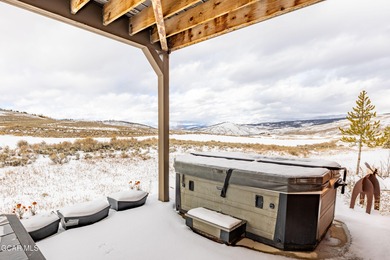 This Granby Ranch home offers a fantastic combination of comfort on Headwaters Golf Course At Granby Ranch in Colorado - for sale on GolfHomes.com, golf home, golf lot