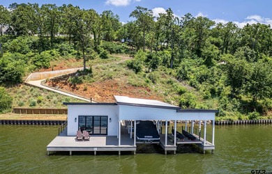 Introducing a RARE opportunity for luxury lakefront living and on Eagles Bluff Golf Course in Texas - for sale on GolfHomes.com, golf home, golf lot