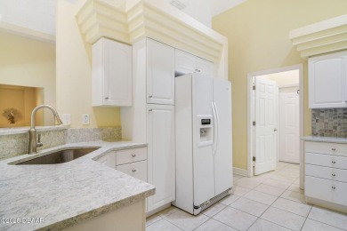Welcome to this charming three-bedroom, two-bathroom home with on The Golf Club At Cypress Head in Florida - for sale on GolfHomes.com, golf home, golf lot